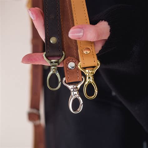 leather bag straps.